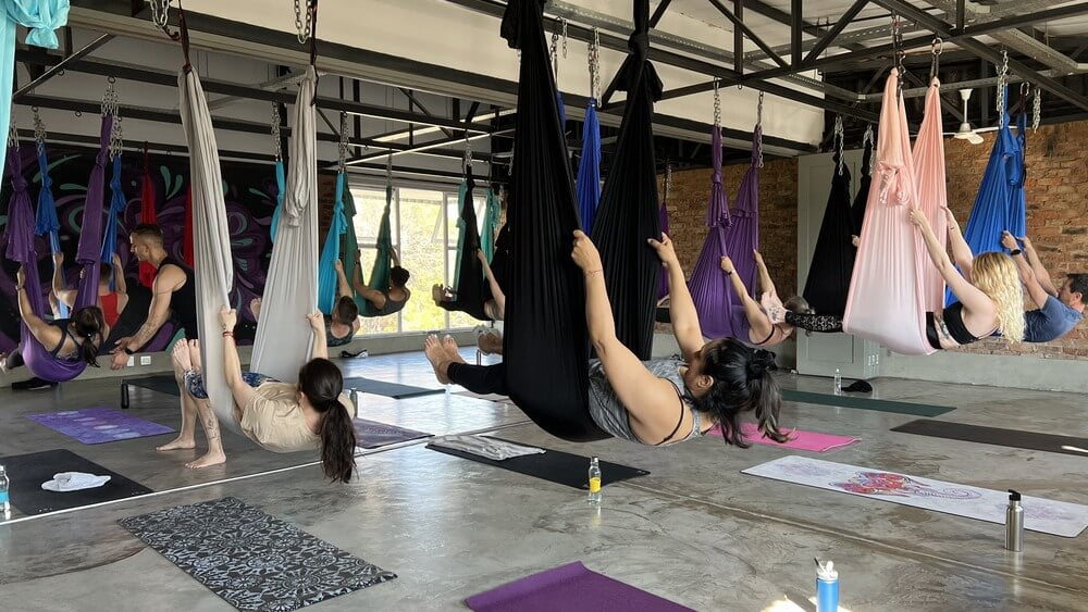 Benefits of Aerial Yoga for Anxiety and Depression - Asana Tribe