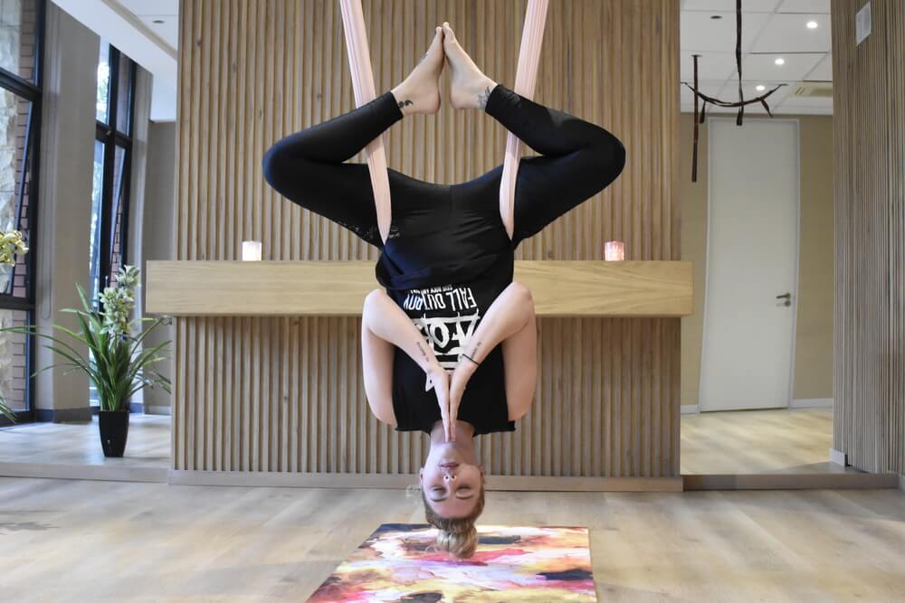 A 'new relationship with gravity': Try aerial yoga