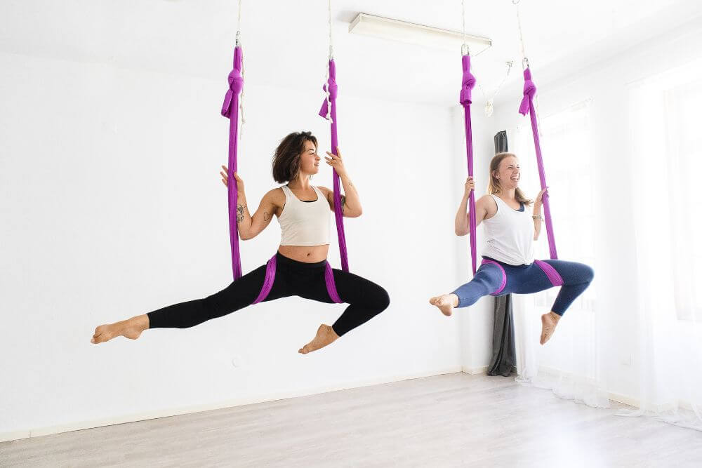 7 Aerial Yoga Poses To Get You Grounded